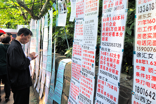 Shanghai, China - May 1, 2014: People's Park, Shanghai, China. Parents traditionally advertise and search for a marriage partner for their son or daughter