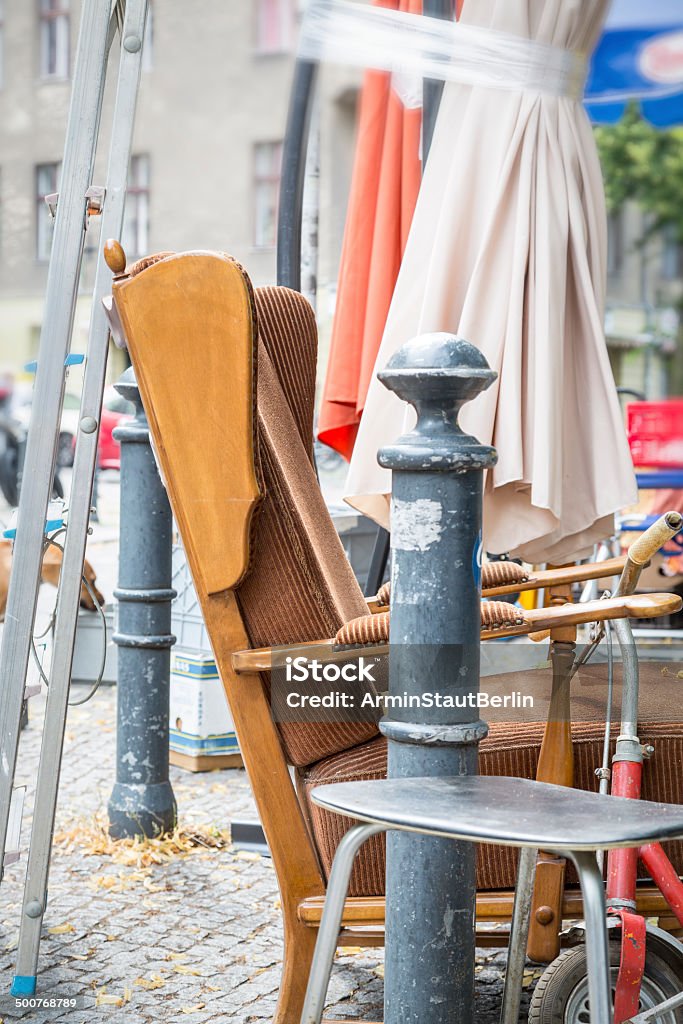old arm chair and stuff on a flea market old arm chair and stuff on a flea market. Ladder Stock Photo