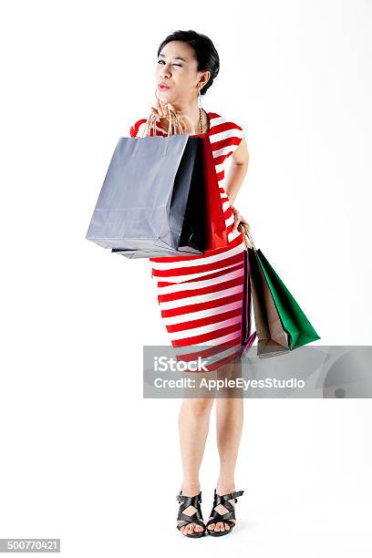 Beautiful Woman With A Lot Of Shopping Bags Stock Photo - Download Image Now - Adult, Asian and Indian Ethnicities, Bag