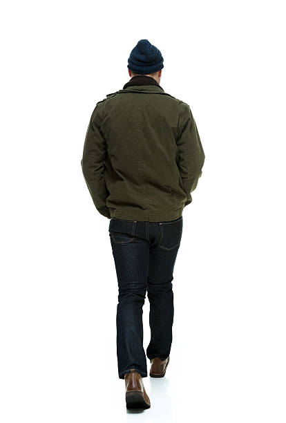 istock Back view of casual walking man 500771602