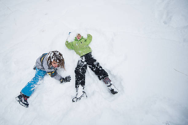 istock Children play in the snow 500771856