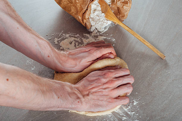 istock Man hands making yeast dough for estonian pastry 500774242
