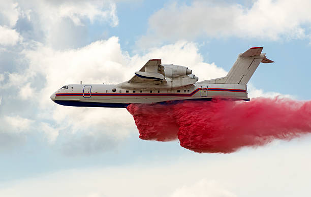 istock Flying aerial firefighting pour water 500779698