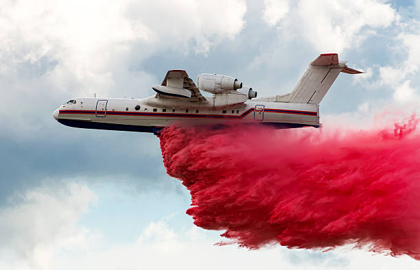 istock Flying aerial firefighting pour water 500779866