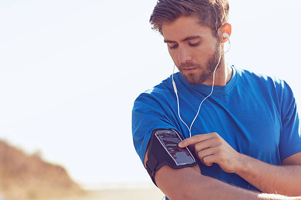 istock Setting up an awesome playlist for his run 500780856