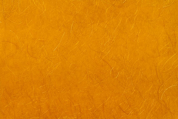 abstrakt golden papier hintergrund - rice paper gold textured abstract stock-fotos und bilder