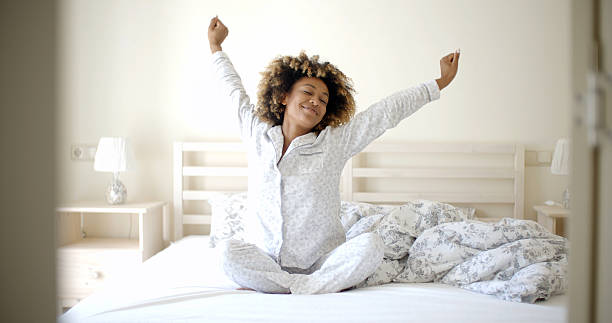 istock Young Woman Awaking On The Bed 500784360