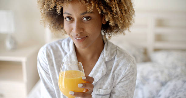 istock African-American Girl Drinking Juice 500784832