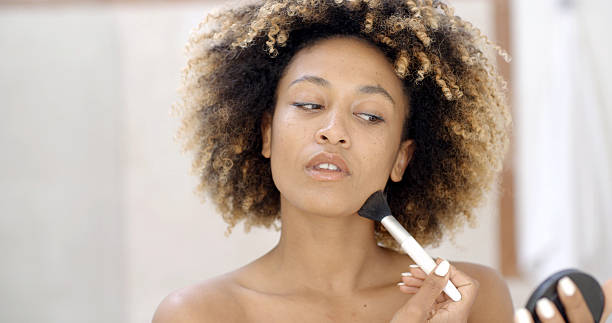 istock Girl With Makeup Brush 500785832