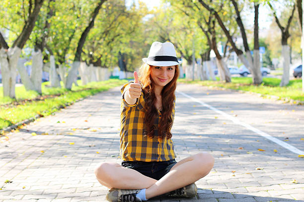 istock red-haired girl in a hat hipster 500786058