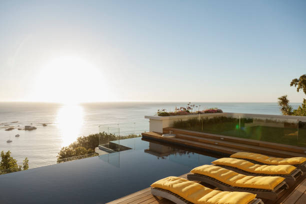 istock View of sunset over ocean from luxury patio 500786145