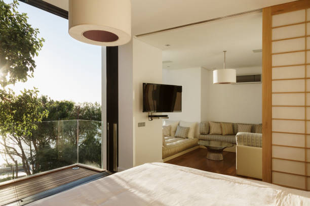 istock Sunny bedroom with balcony 500786289
