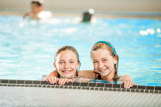 istock Friends Swimming Together 500786332
