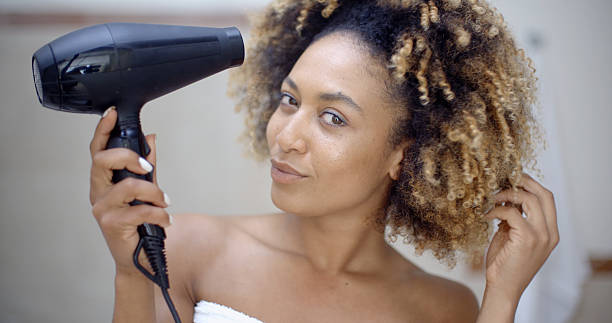 istock Attractive Girl Dries Hair 500786862