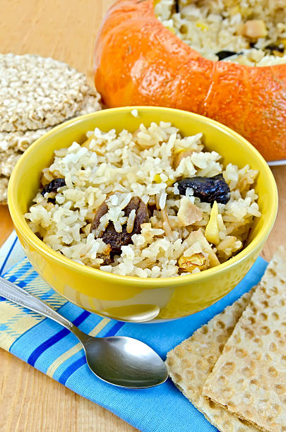 istock Rice porridge with pumpkin on the board 500787559