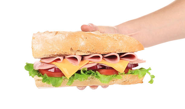 istock Big fresh sandwich in hand. 500787881