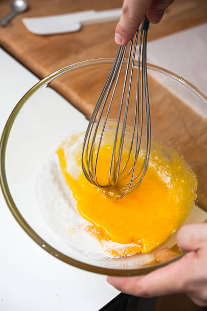 istock whipping yok eggs and sugar together 500792565