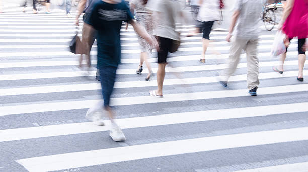 istock People across the zebra crossing 500793409