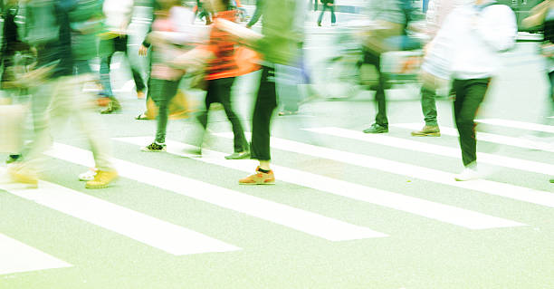 istock People across the zebra crossing 500793411