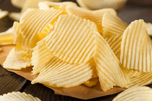 Unhealthy Crinkle Cut Potato Chips Ready to Eat