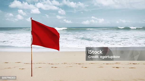 Red Flag On Beach Stock Photo - Download Image Now - Flag, Red, Beach