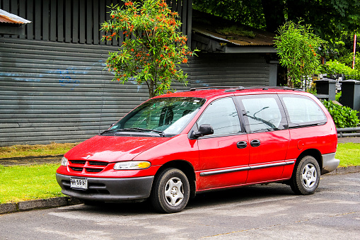 Pucon, Chile - November 20, 2015: Motor car Chrysler Caravan is parked at the town street.