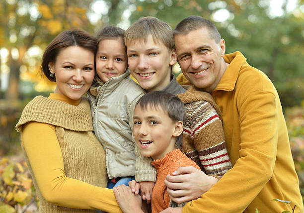 istock Family relaxing in autumn park 500801366