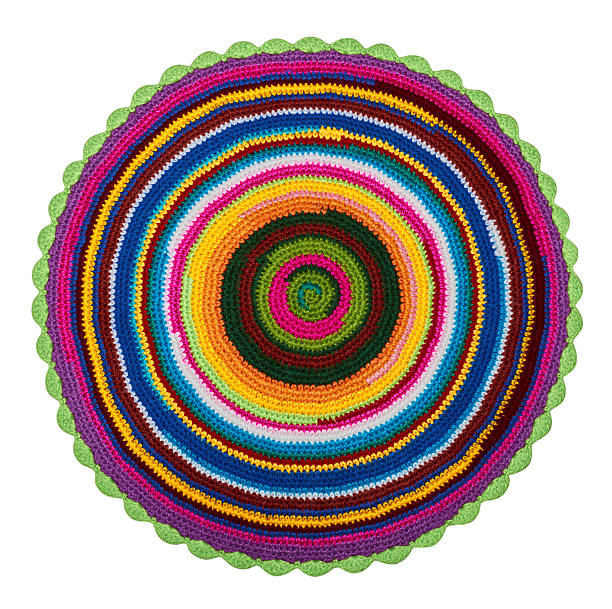 istock Colorful knitted crochet acrylic mat on a white background 500802440