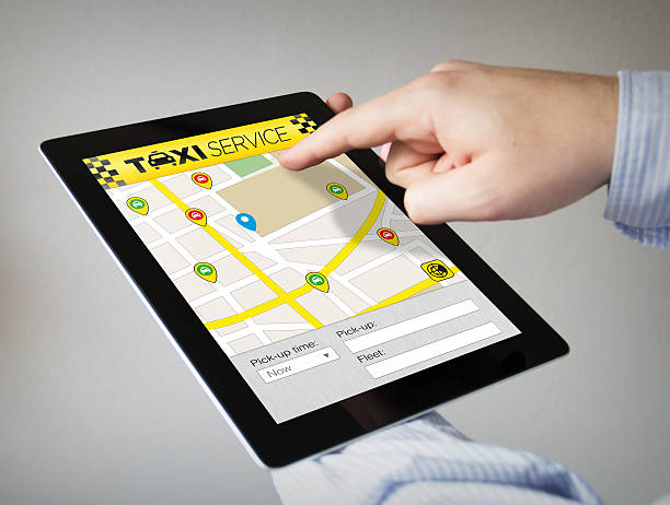 istock taxi app on a tablet 500805634