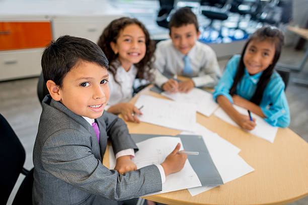 istock Kids in a business meeting 500806329