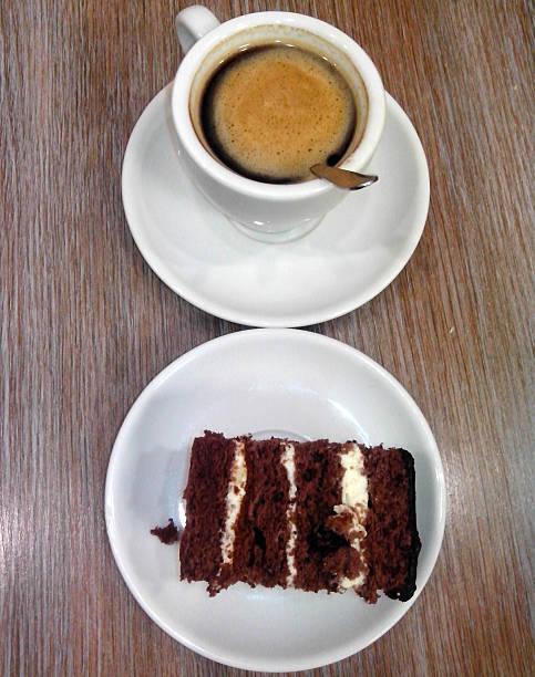 istock Cup of coffee and cake on a saucer. 500806528