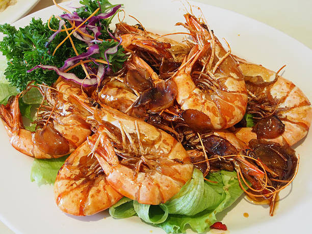 istock Cooked King Prawn in Asian Style (Sweet and Sour Sauce) 500808328