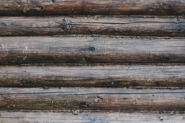 istock Old wooden loghouse background with log texture 500808395