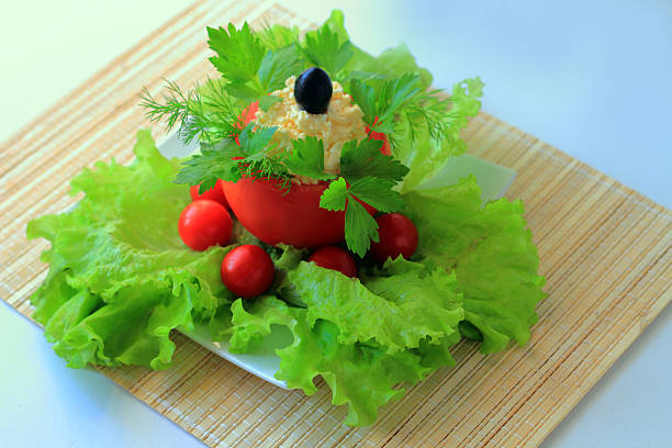Stuffed tomato on a dish
