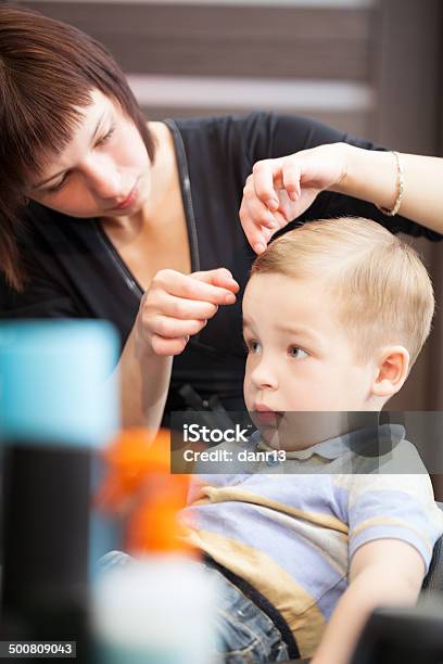 Hairdresser Finishing Boys Haircut With Hair Setting Stock Photo - Download Image Now