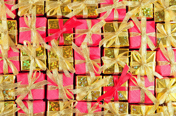 istock Golden and red gifts as background 500812188