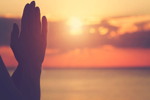 istock Young woman practicing yoga on the beach. 500812252