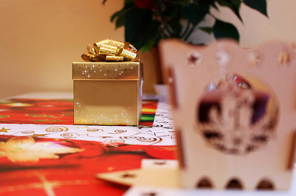 Golden christmas gift box with surprise inside stock photo