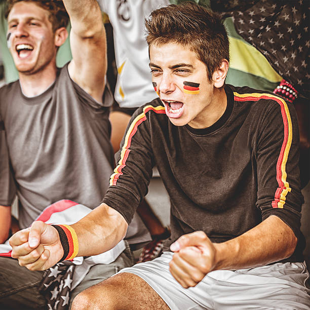 istock deutsch supporter at the soccer stadium 500828421