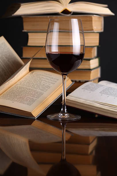 istock Wine glass and books 500828623