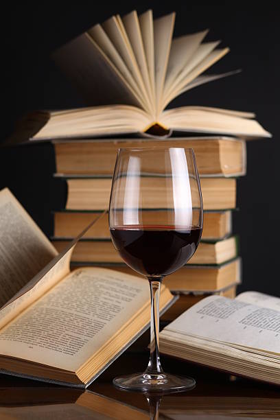 istock Wine glass and books 500828747