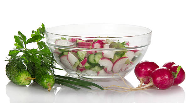 istock Spring salad from cucumbers and a garden radish 500828777