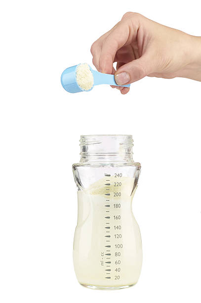 istock Mother prepares baby milk formula 500829099