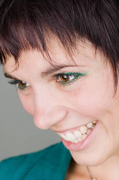 young woman smiling and laughing stock photo