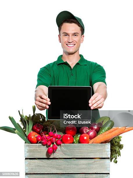 Delivery Man With Digital Tablet Stock Photo - Download Image Now - Men, Supermarket, White Background