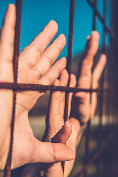 istock Hands of Migrants at the Border, Hand Gestures 500832862