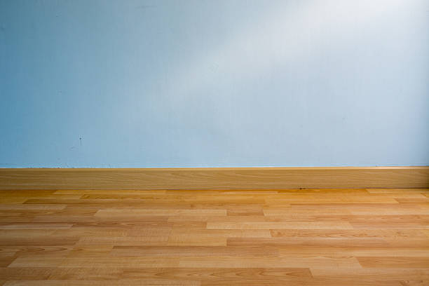 istock wood floor and light blue wall for background 500835062