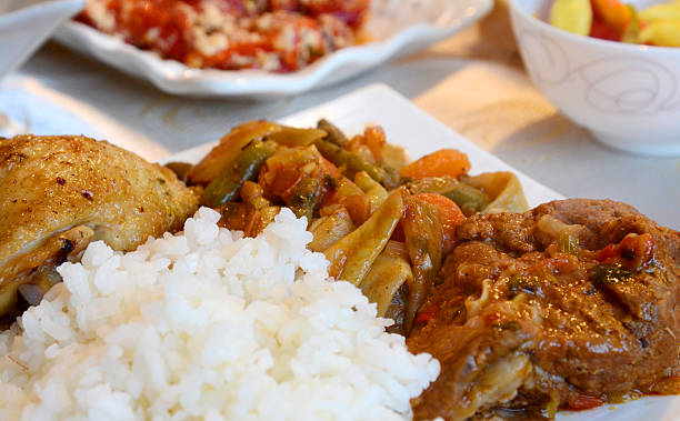 istock roast meat with vegetables and rice 500837236