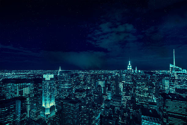 Manhattan during night View over Manhattan Skyline in the night image created 21st century blue architecture wide angle lens stock pictures, royalty-free photos & images