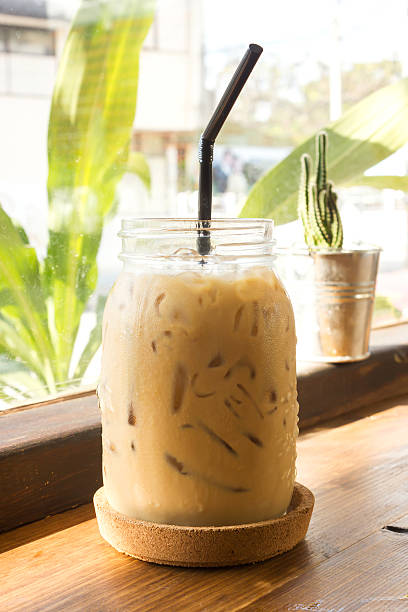 istock Ice coffee on wooden table. 500840622
